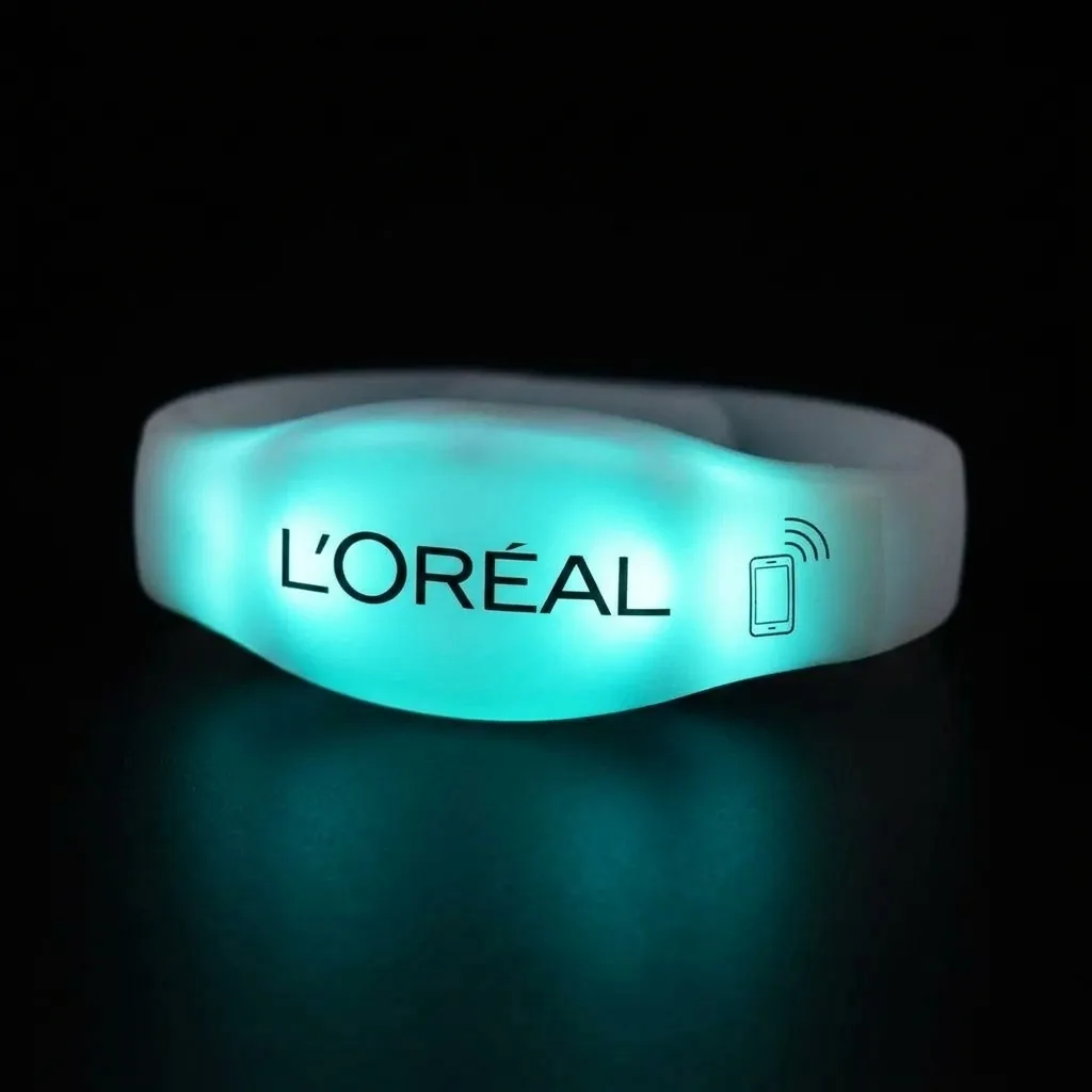 Bracelet LED lumineux avec marquage L'Oréal et pictogramme NFC
